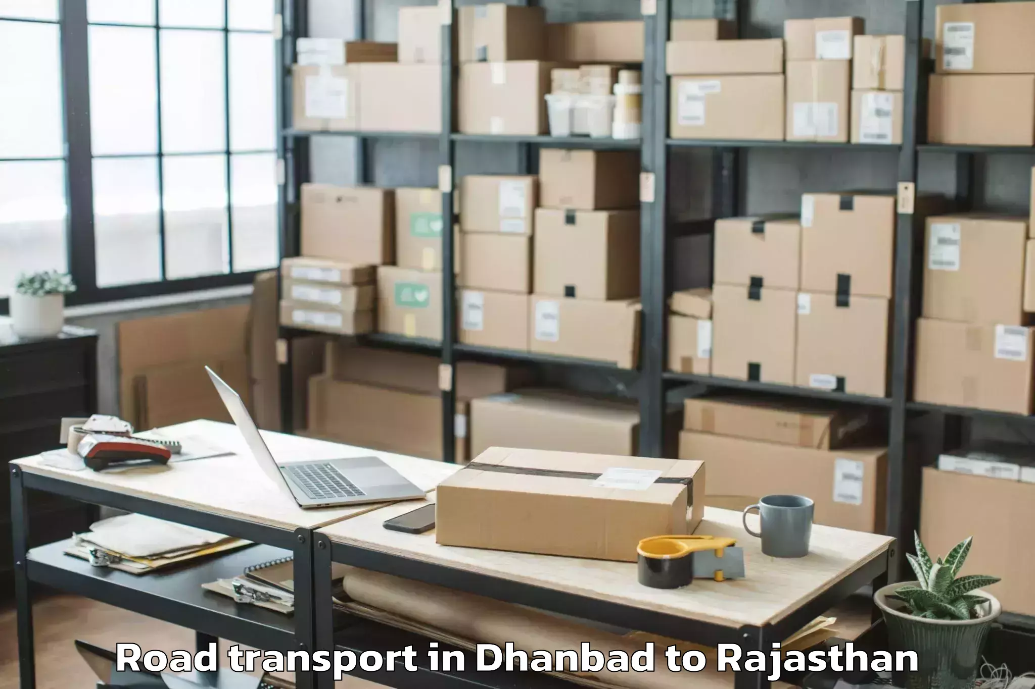 Book Your Dhanbad to Bandikui Road Transport Today